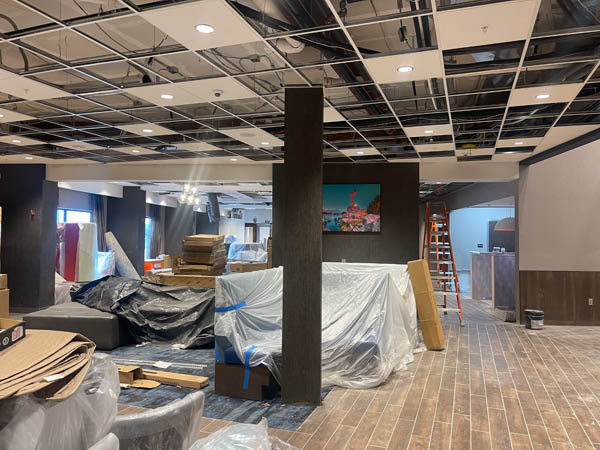 Lobby walls, ceiling, and furniture nearing completion